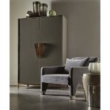 Shield Cabinet A Simple, Refined Cabinet Finished In Dark Grey Lacquer, With Contrasting Square,