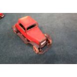 Unibuilder red and black tin wind up car