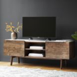Vana Media Cabinet The Vana media cabinet gives a bit of a modern twist to a mid century design -