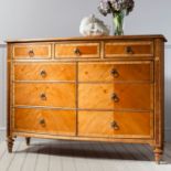Spire 9 Drawer Chest Crafted from Mindy Ash solid wood, features blonde European walnut and American