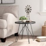 Fusion Side table fuses rustic detail and industrial inspiration with modern silhouettes tempered