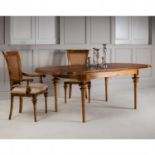 Spire Dining Oval Extending Table Featuring beautiful marquetry of blonde European walnut with
