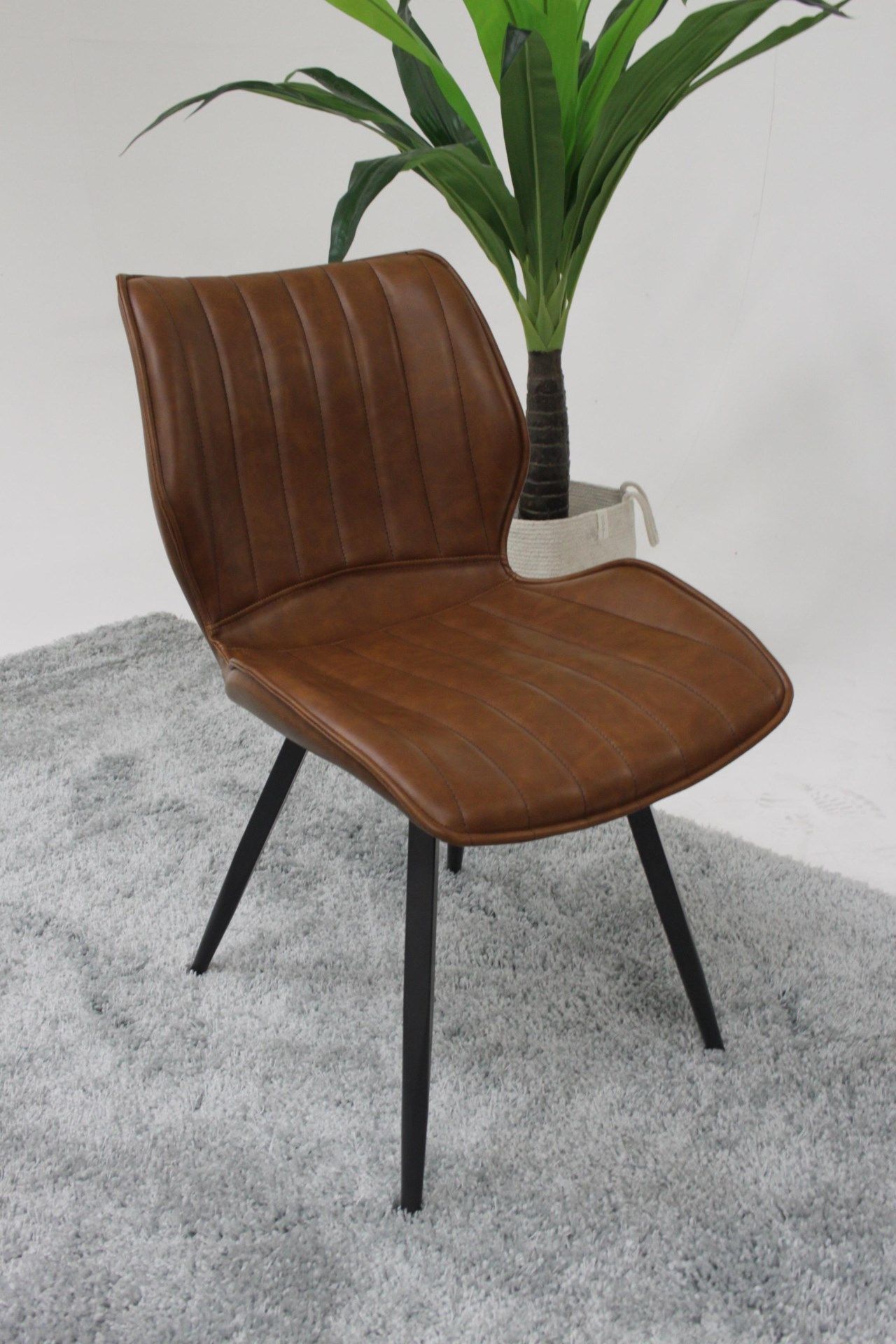 Alfa Ribbed Dining Chair Vegan Leather Tan Striped Quilted Upholstery Gives A Luxury Finish To These