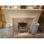 Fire Surround Wood Mantle with pink marble back plate and hearth with electric rustic heater brass