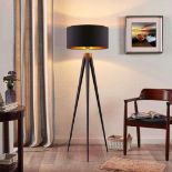 Tripod Flloor Lamp golden surface shade can also be seen, as the inside of the cylindrical lampshade