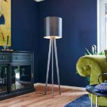 Tripod fabric floor lamp perfect for integration into the home where it will stand as a floor lamp