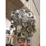 Disc Pendant Chandelier This is a fantastic modern day interpretation of the modernist mid-century