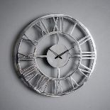 Polished Aluminium Wall Clock This attractive wall clock features Roman numerals with classic