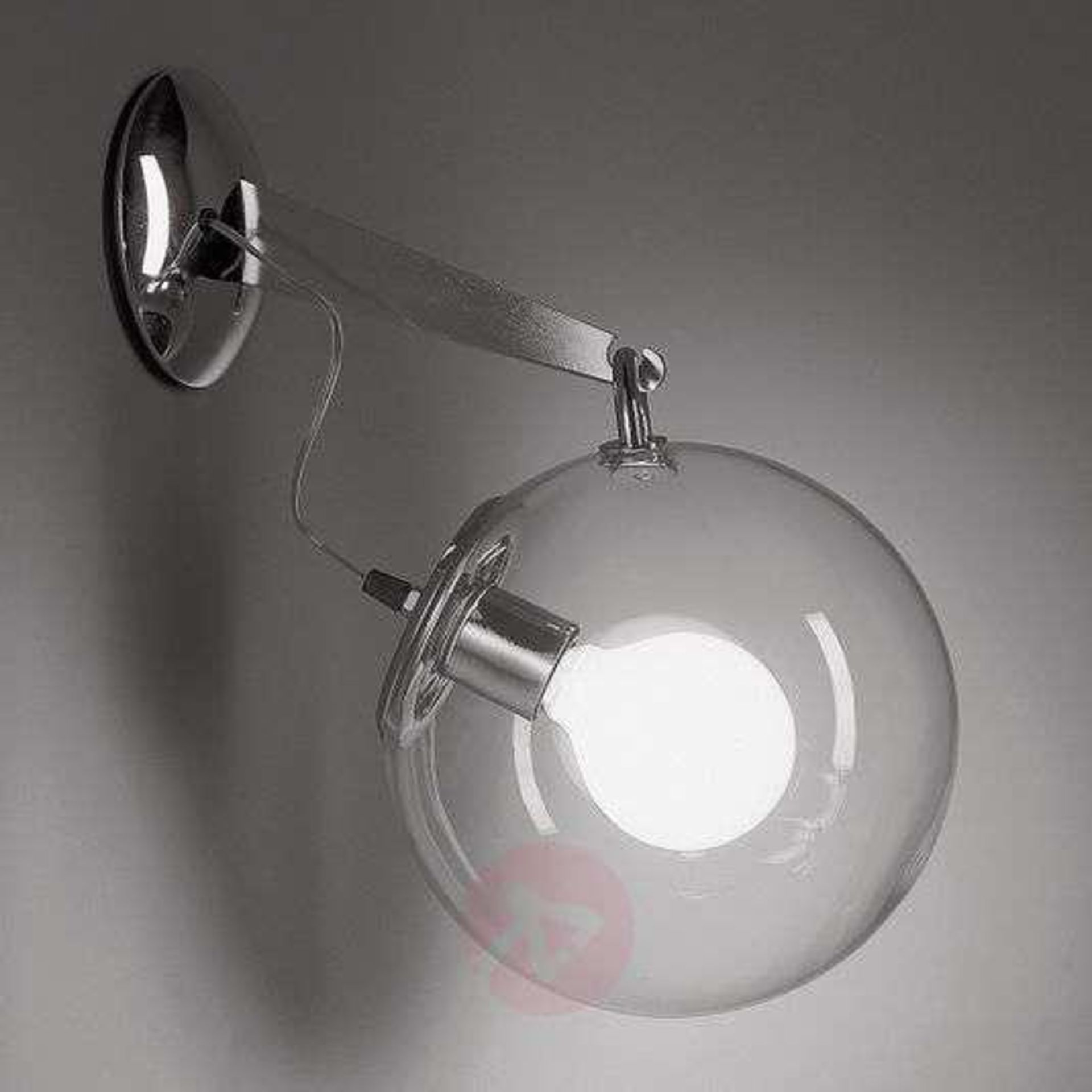 Artemide Miconos glass wall light in chrome The Miconos wall light is produced in Italy by the