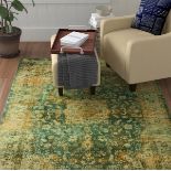 Persian Inspired Green Rug Your home is a place full of objects rich in meaning, a living reflection