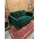 Henry Two Seater Velvet Sofa - Emerald Green Henry is a contemporary sofa collection with classic