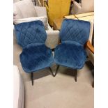 A Pair Of Alpha Dining Chairs Diamond Quilted Upholstery Gives A Luxury Finish To These Mid