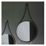 Broadway Round Mirror 510x910mm This industrial style mirror has a metal hanging feature.