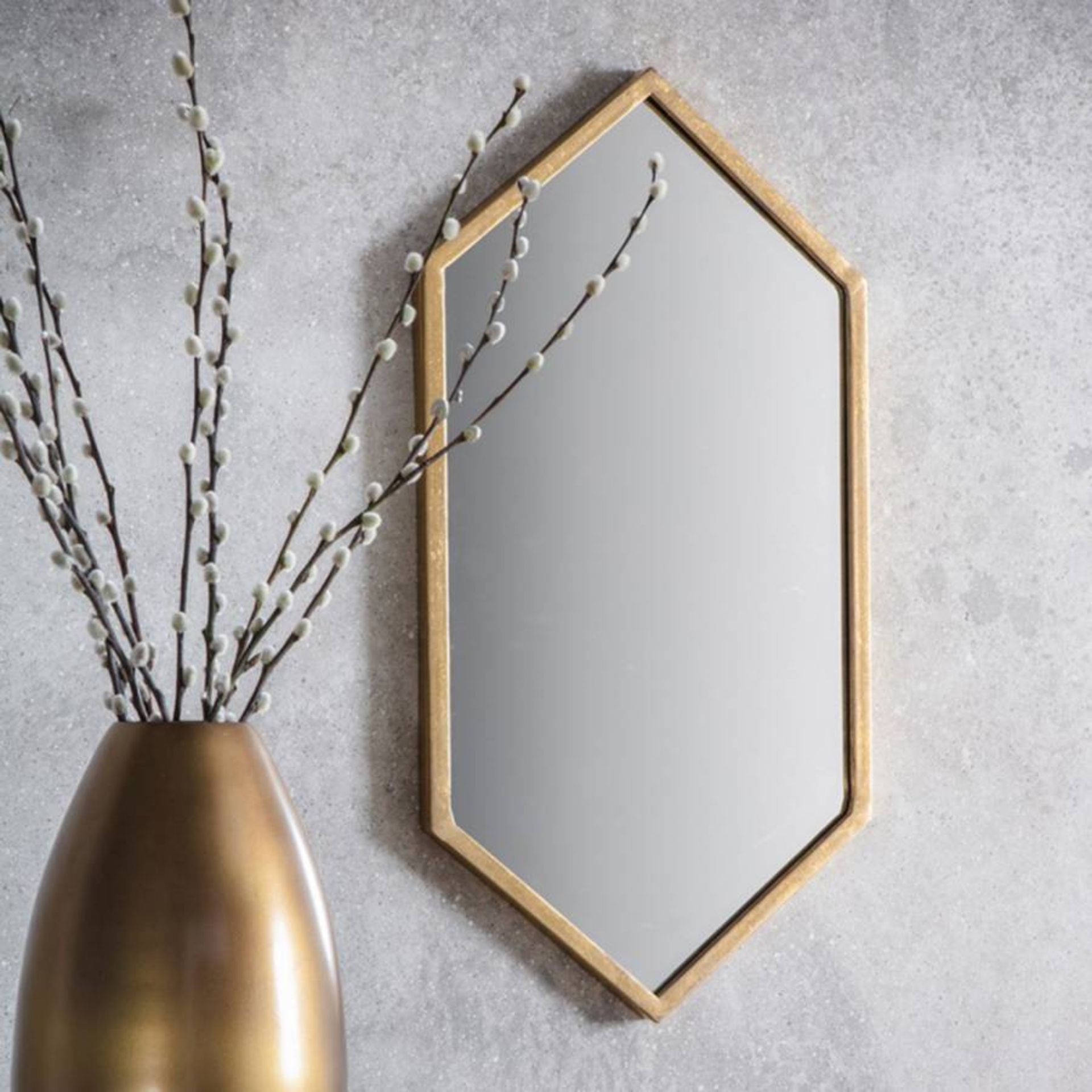 Helston Antique Gold Wall Mirror Featuring a stunning hexagonal-shaped mirror design complimented