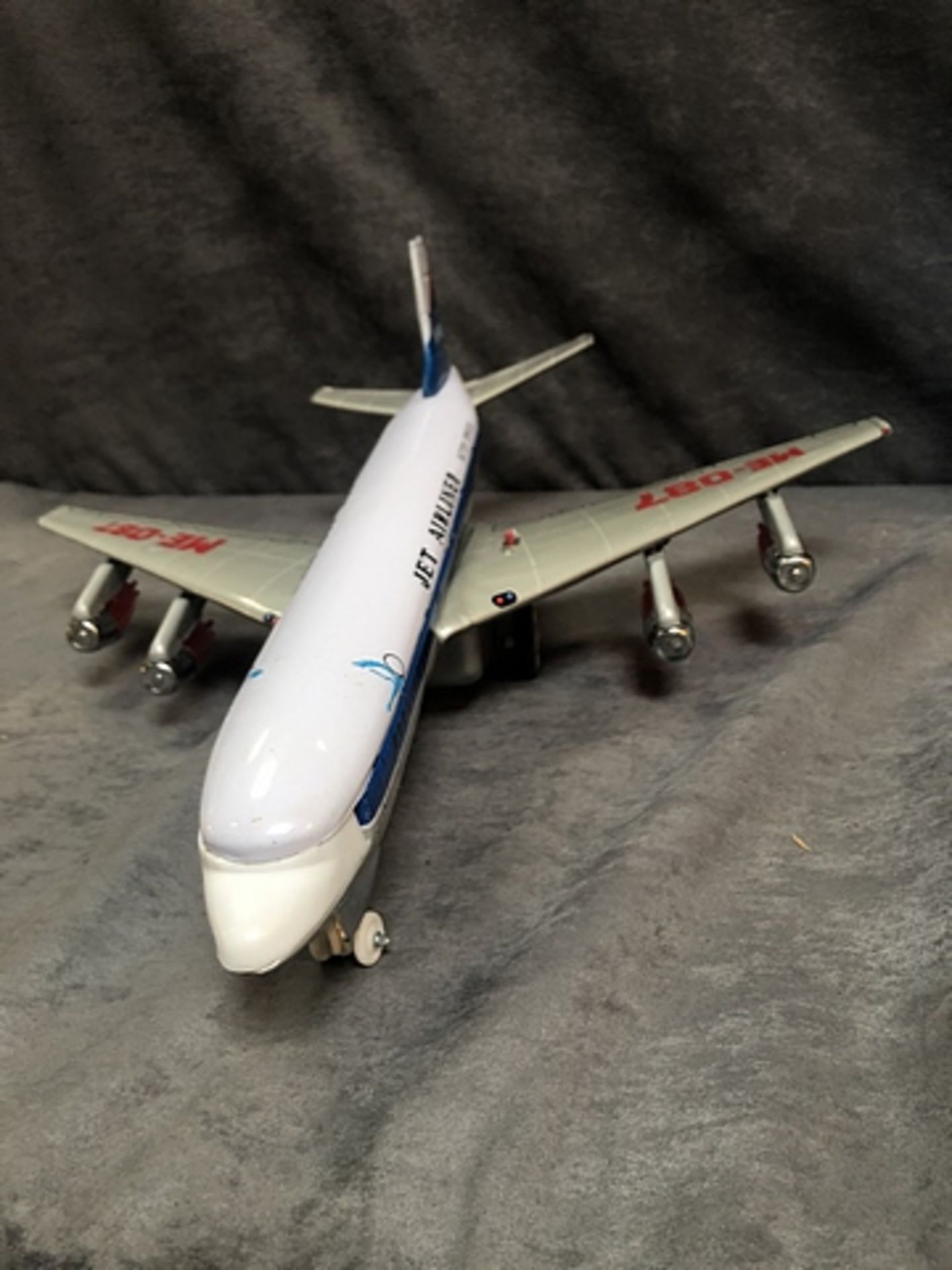 Red China ME087 1970's Tin Battery Operated Jet Airliner Length: 185 Inches (47 Cm)Wingspan : 177