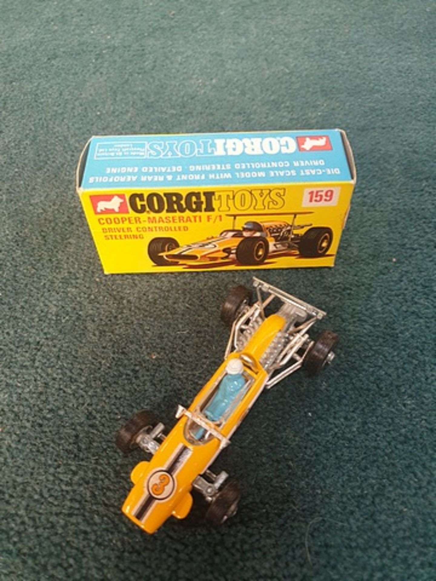 Corgi Toys # 159 Cooper Maserati F/1 With Driver Controlled Steering In Yellow Complete With Box