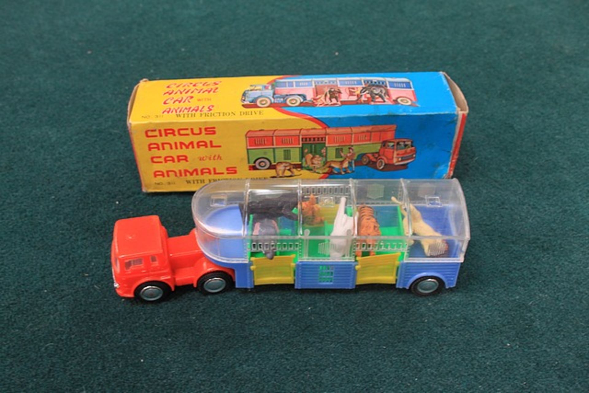 Hong Kong Model No 311 Friction Drive Circus Animal Car With Animals Truck Is 9 1/2 Inches Long