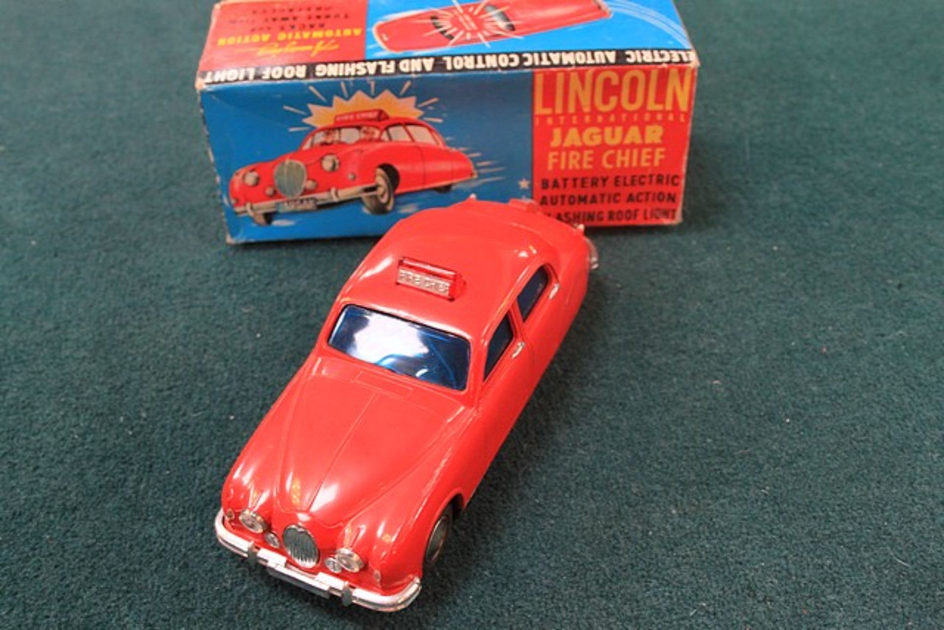 LINCOLN INTERNATIONAL 1960s BATTERY OPERATED JAGUAR FIRE CHIEF CAR IN THE ORIGINAL BOX 8 1/2" L - Image 3 of 3