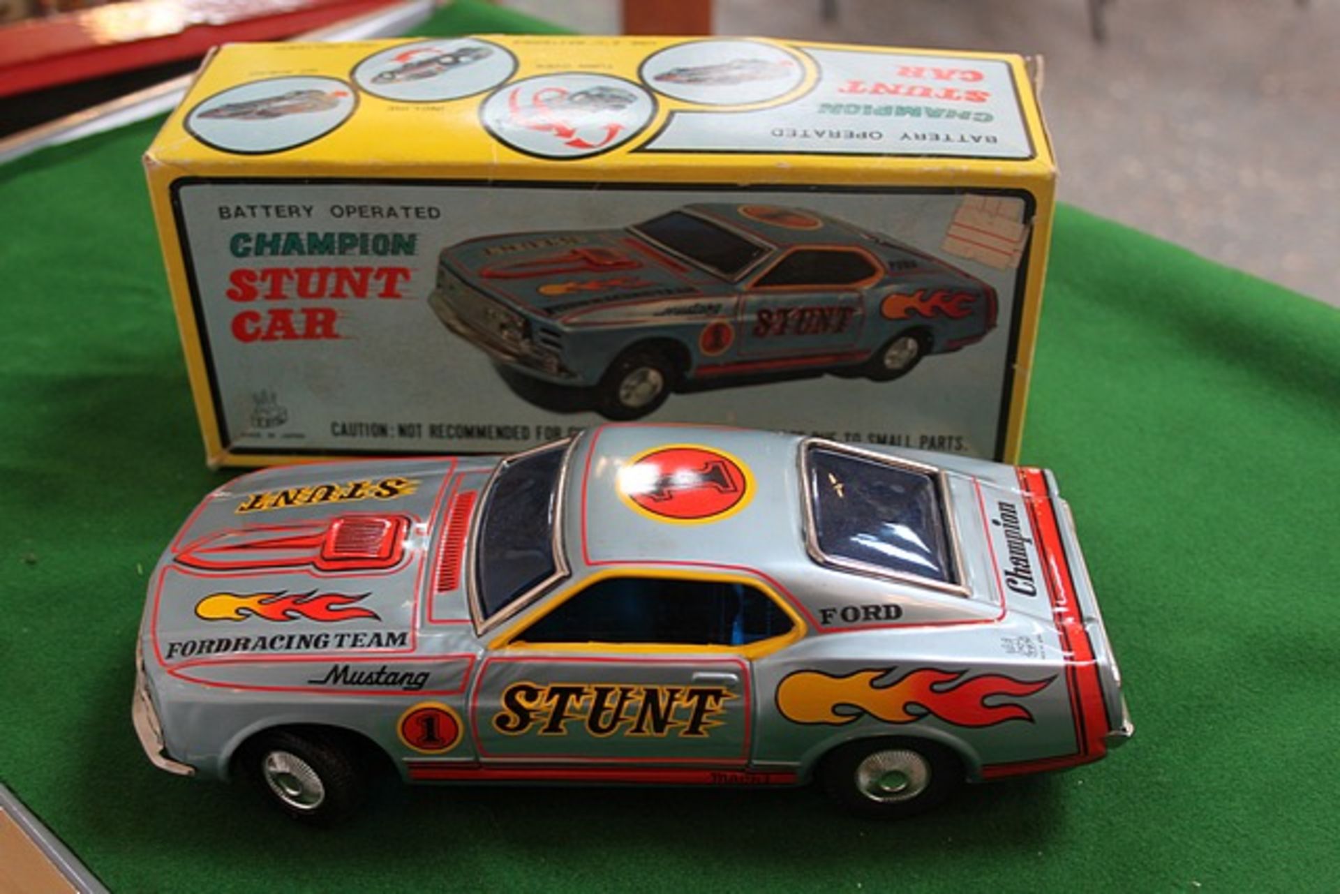 Tokyo Plaything Shokai Co. TPS Japan Battery Operated Champion Stunt Car 10.5 Inches Battery