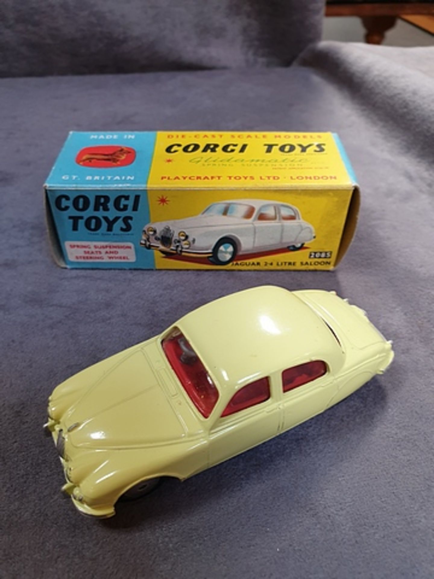 Corgi Toys diecast # 280S Jaguar 24 Litre Saloon in yellow with red interior complete in box