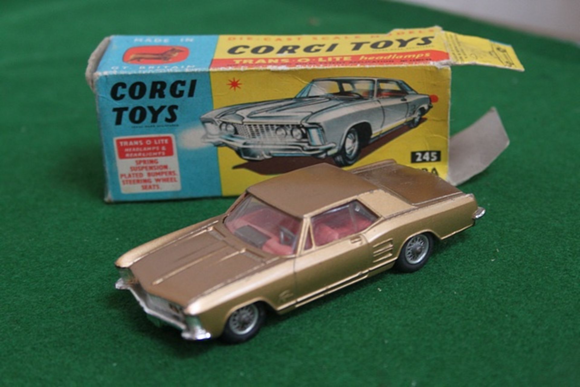 Corgi Toys # 245 Diecast Buick Riviera In Bronze With Red Interior Complete With Box (Box Is