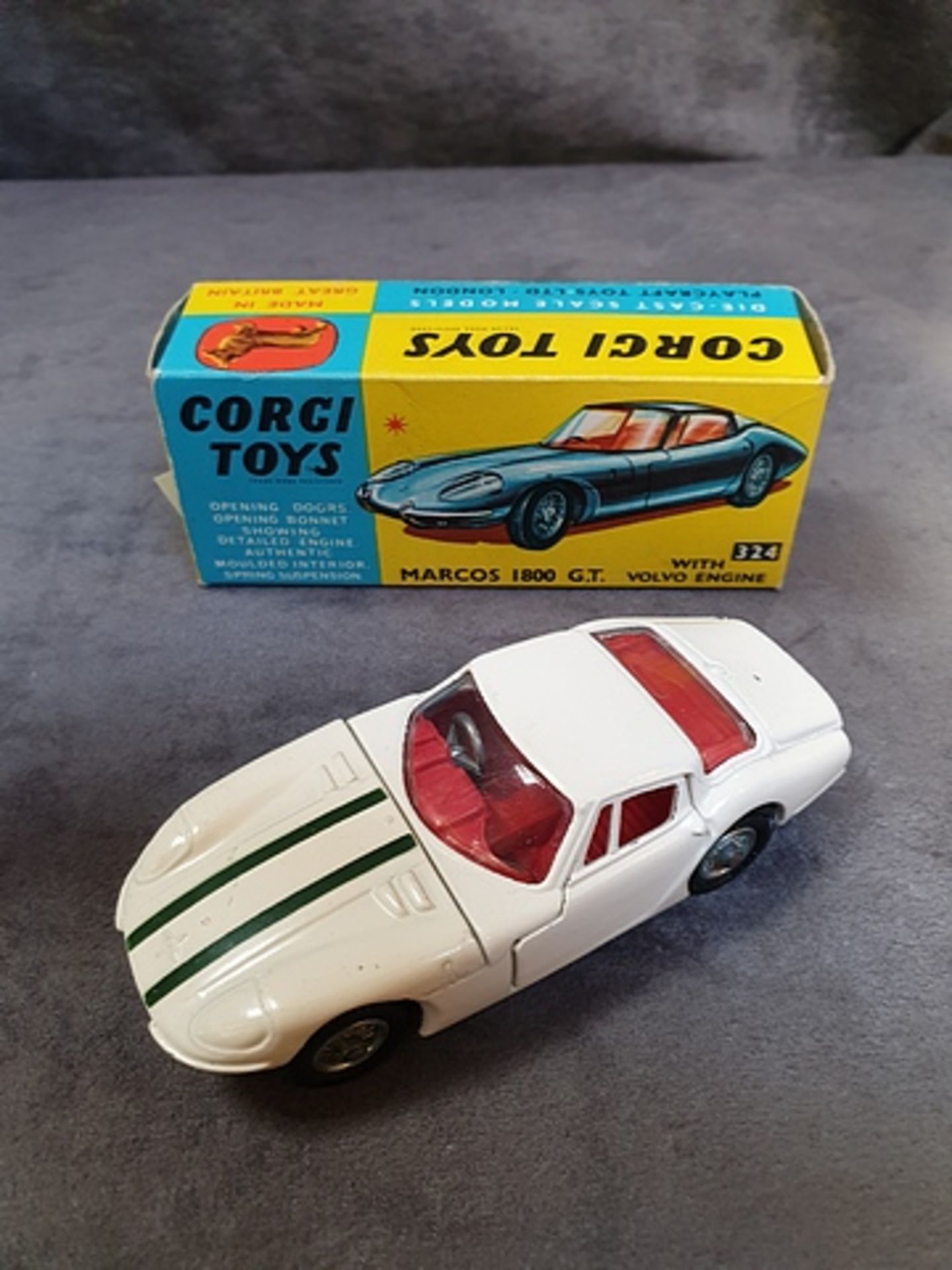 Corgi Toys diecast # 324 Marcos 1800GT with Volvo Engine white with green stripes an red interior