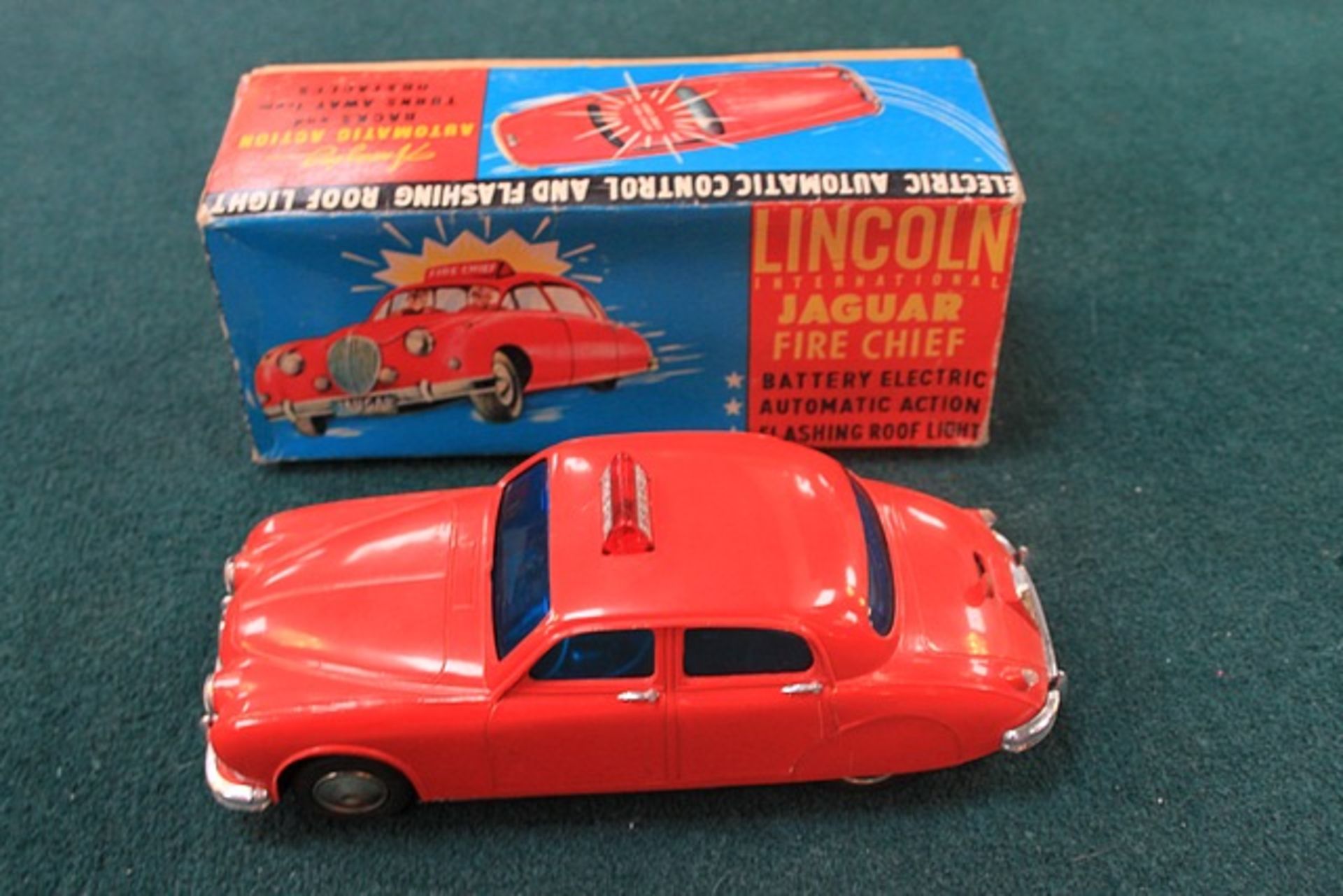 LINCOLN INTERNATIONAL 1960s BATTERY OPERATED JAGUAR FIRE CHIEF CAR IN THE ORIGINAL BOX 8 1/2" L - Image 2 of 3