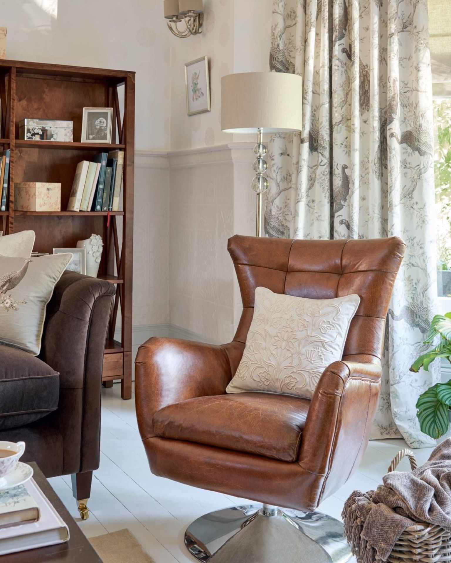 Laura Ashley Clearwell Swivel Chair Brown Nubuck Leather Sink into our comfortable Clearwell