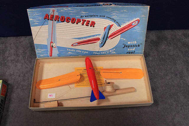 Aerocopter With Joystick And Reel. An Aeroplane With Rotating Wings In Box With Instructions