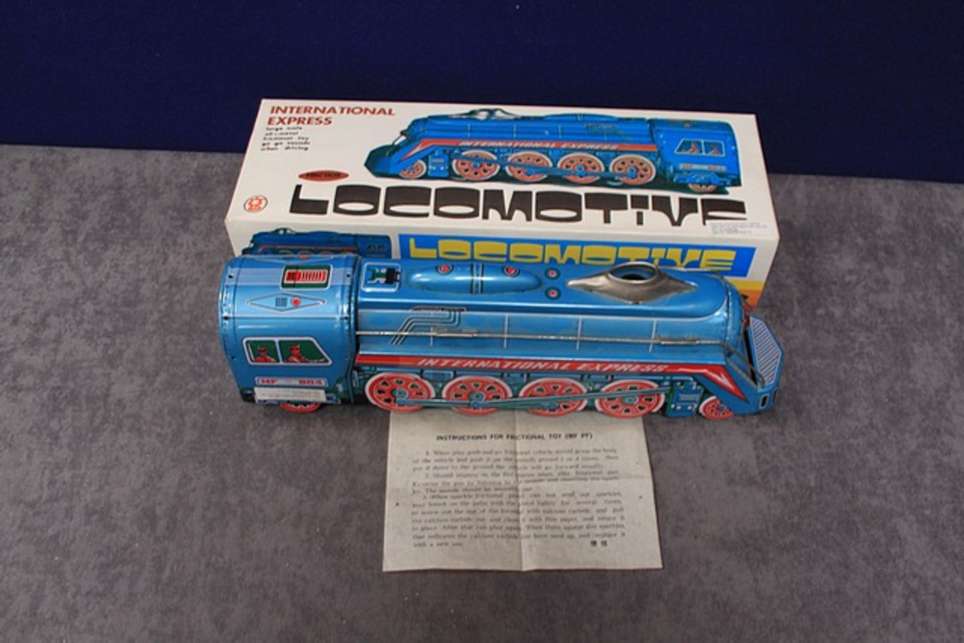 China MF804 Friction Powered International Express Locomotive With Instructions And Box