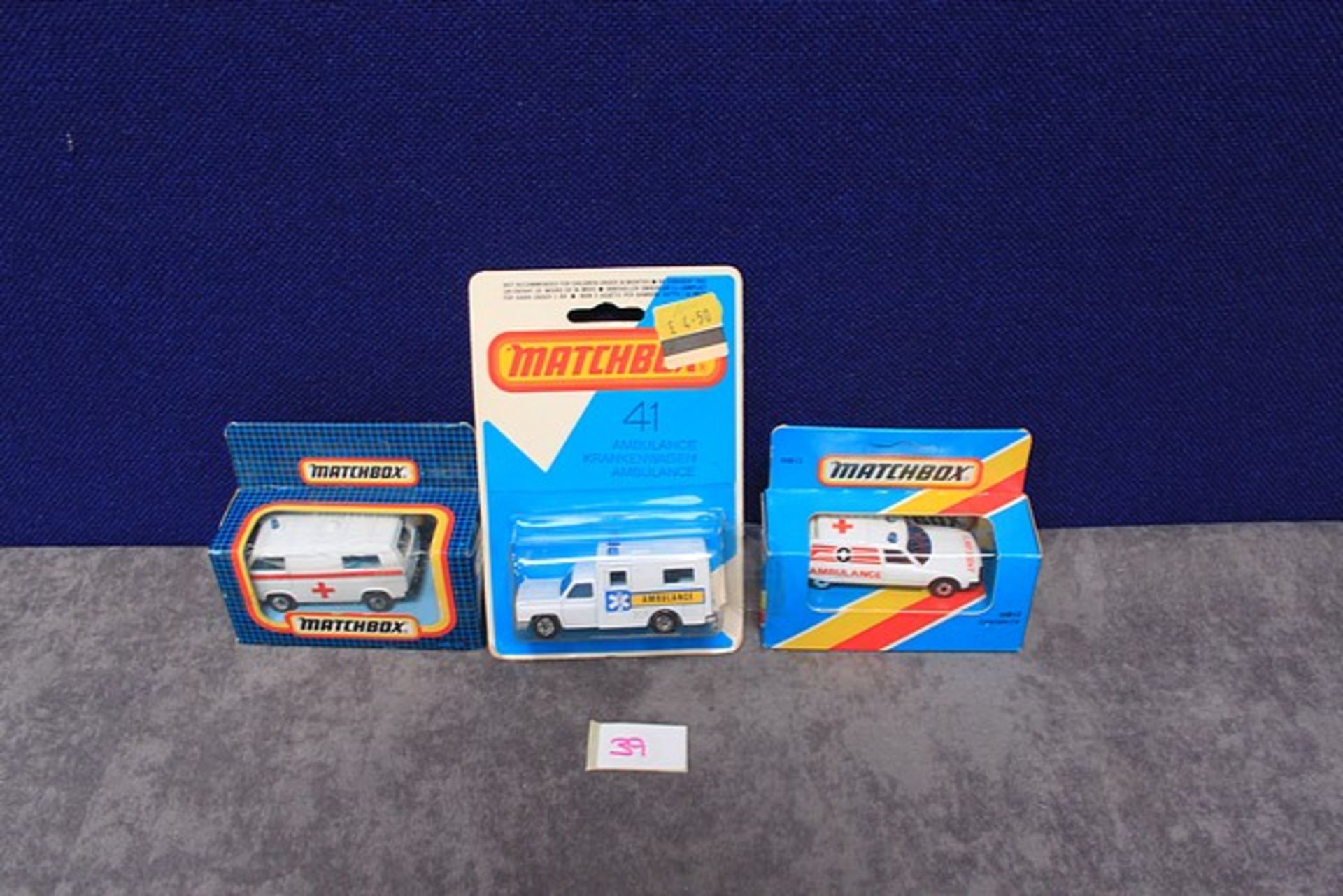 3x Matchbox Diecast Ambulances Comprising Of; Number 41 Ambulance With A Blue Cross On Card,