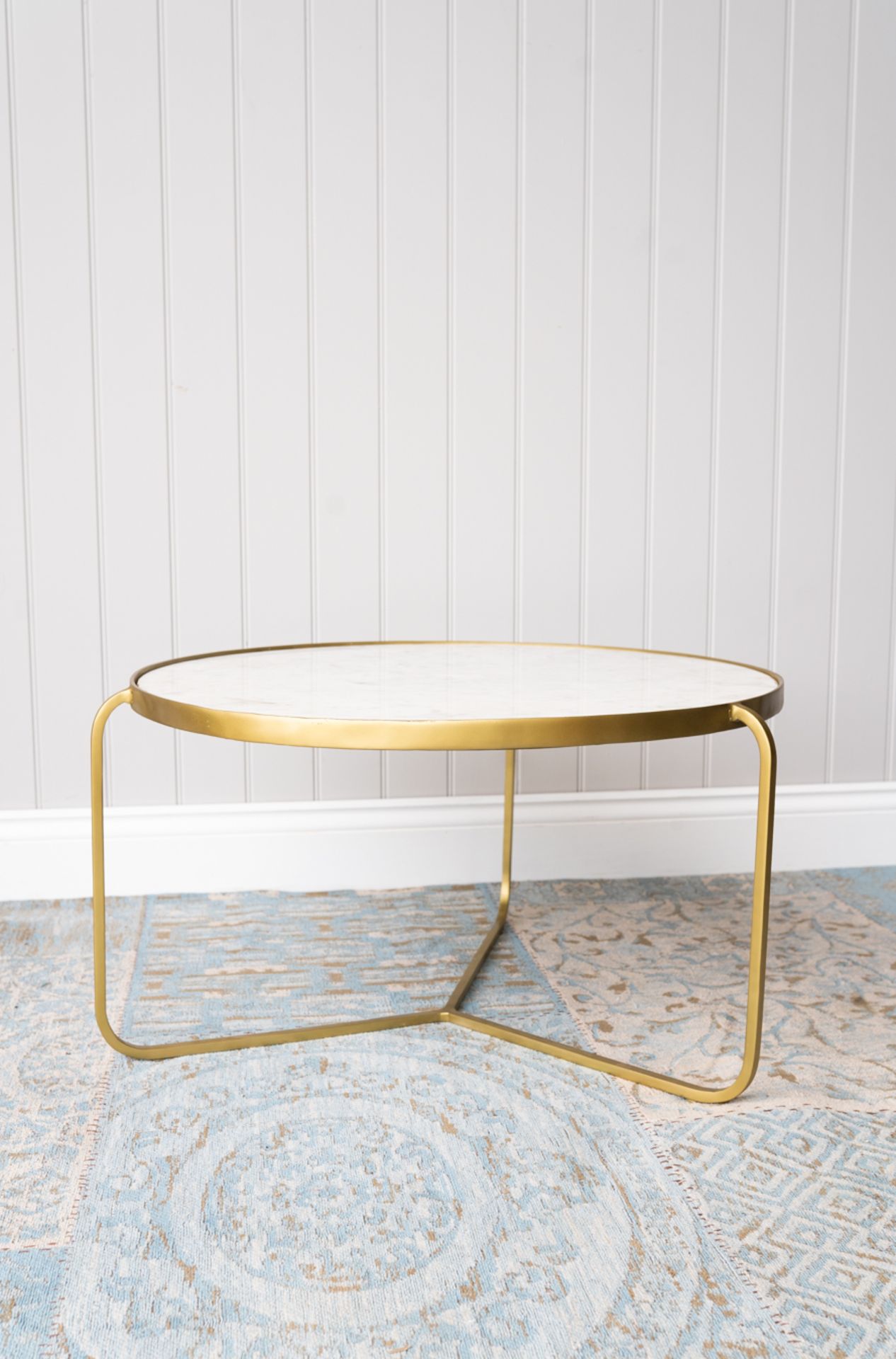 Round Coffee Table - White and Brass: A stunning three legged brass finish coffee table.