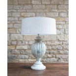 Grey Wash Lamp: A beautiful wooden table lamp finished in a distressed grey wash textured paint.