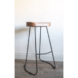 Tall Dark Wood and Iron Stool: A gorgeous high bar stool with an ergonomic seat.