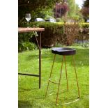 Tall Black Wood and Copper Stool: A gorgeous high bar stool with an ergonomic seat.