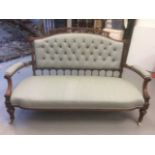 A Victorian Walnut and Upholstered Settee. Covered In Later Damask The Button Upholstered Back