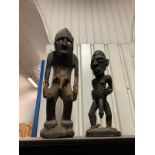 A set of 2 x hand carved besppoke traditional wooden african men fertility statues 77cm and 52cm