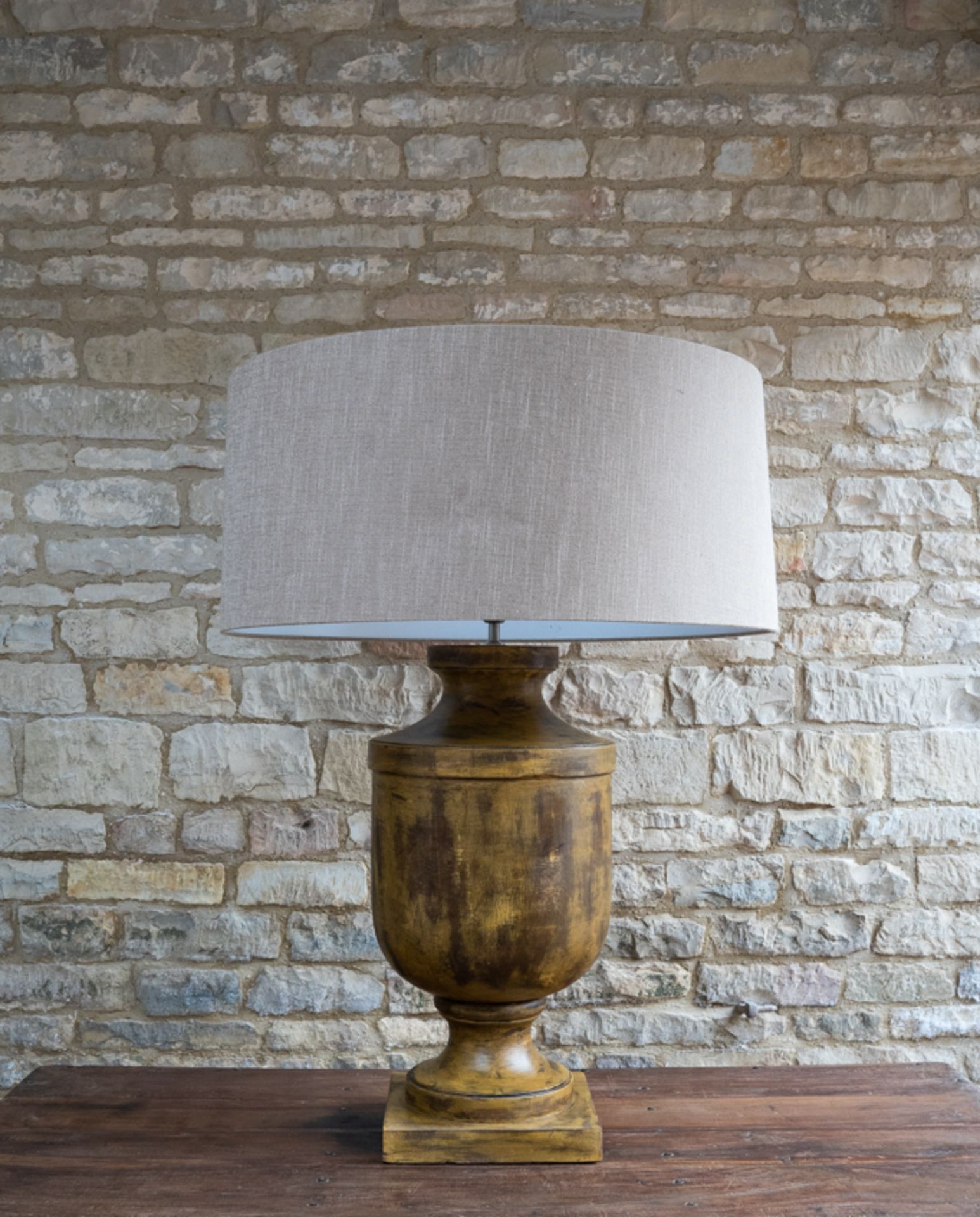 Distressed Lamp: A gorgeous cylindrical wooden table lamp.