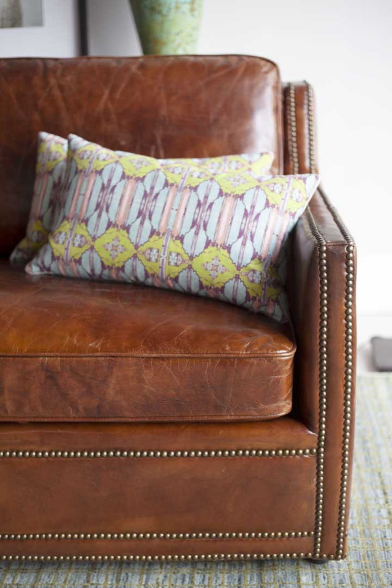 Rustic Leather Sofa - Brown: Inspired by classic design, this sofa boasts luxurious shining leather. - Image 4 of 5