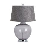 Amelia Smoked Glass Table Lamp Designed with a smoked glass base that's cut into a sleek, organic