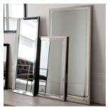 Palma Mirror Large rectangle mirror with layered detailing on the frame. Glamorous style and chic