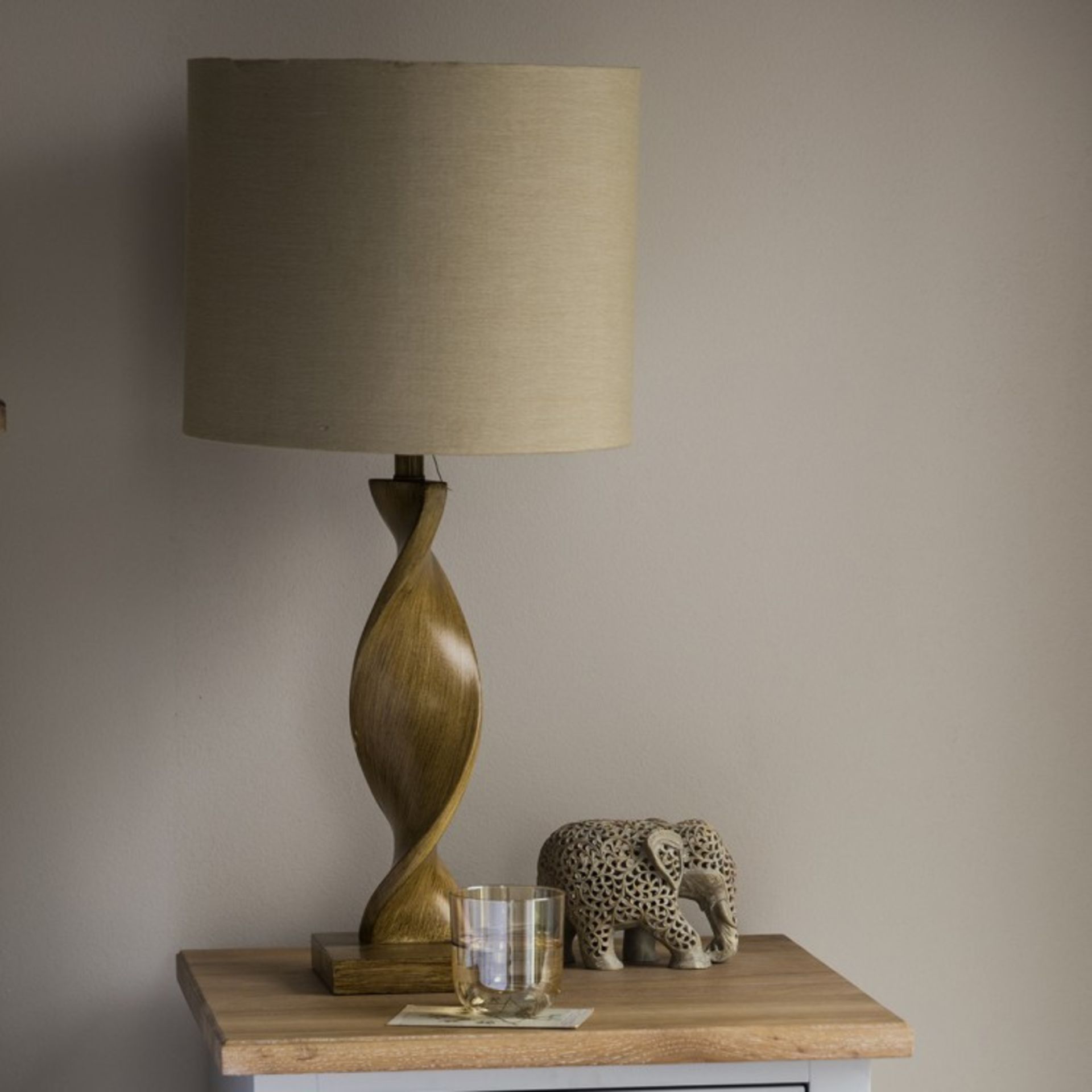 Argenta Table Lamp Sleek spiral table lamp in a neutral, light wood finish with a fabric shade.