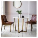 Cleo Round Dining Table Marble The Cleo is a white Volkas marble featuring subtle natural tones in