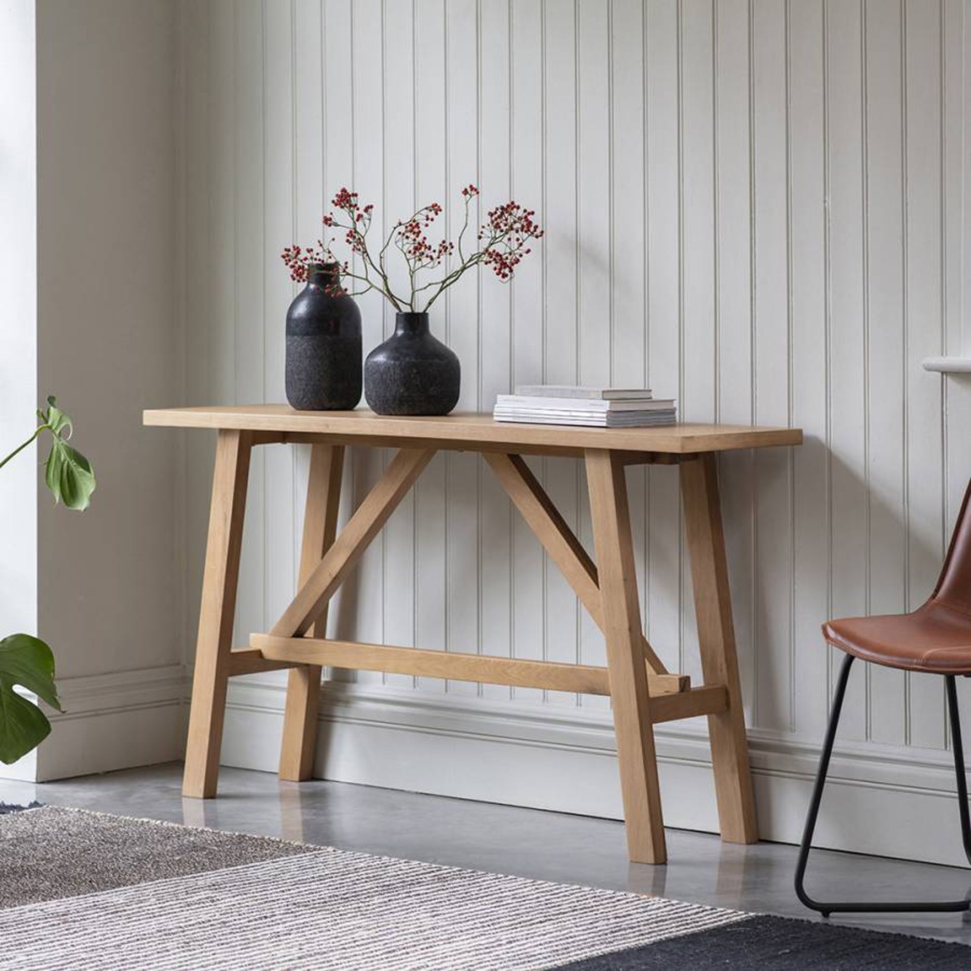 Clapham Console Table Oak With a mixture of vaneer and oak, the Clapham range offers robust pieces