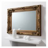 Carved Louis Mirror Gold This beautiful baroque style mirror sits perfectly in a modern home and a