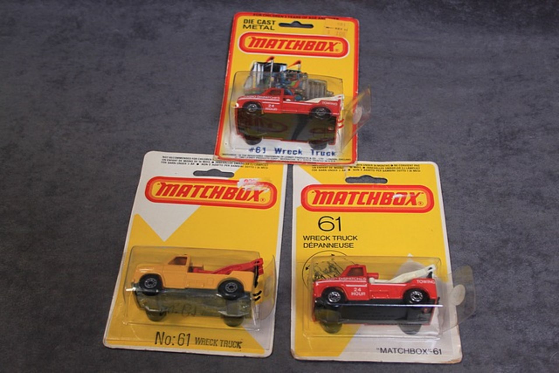3 X Matchbox Diecast Models #61 1 X Red Body With Black Hook 1 X Red Body With Red Hook And 1 X Dark - Image 2 of 2