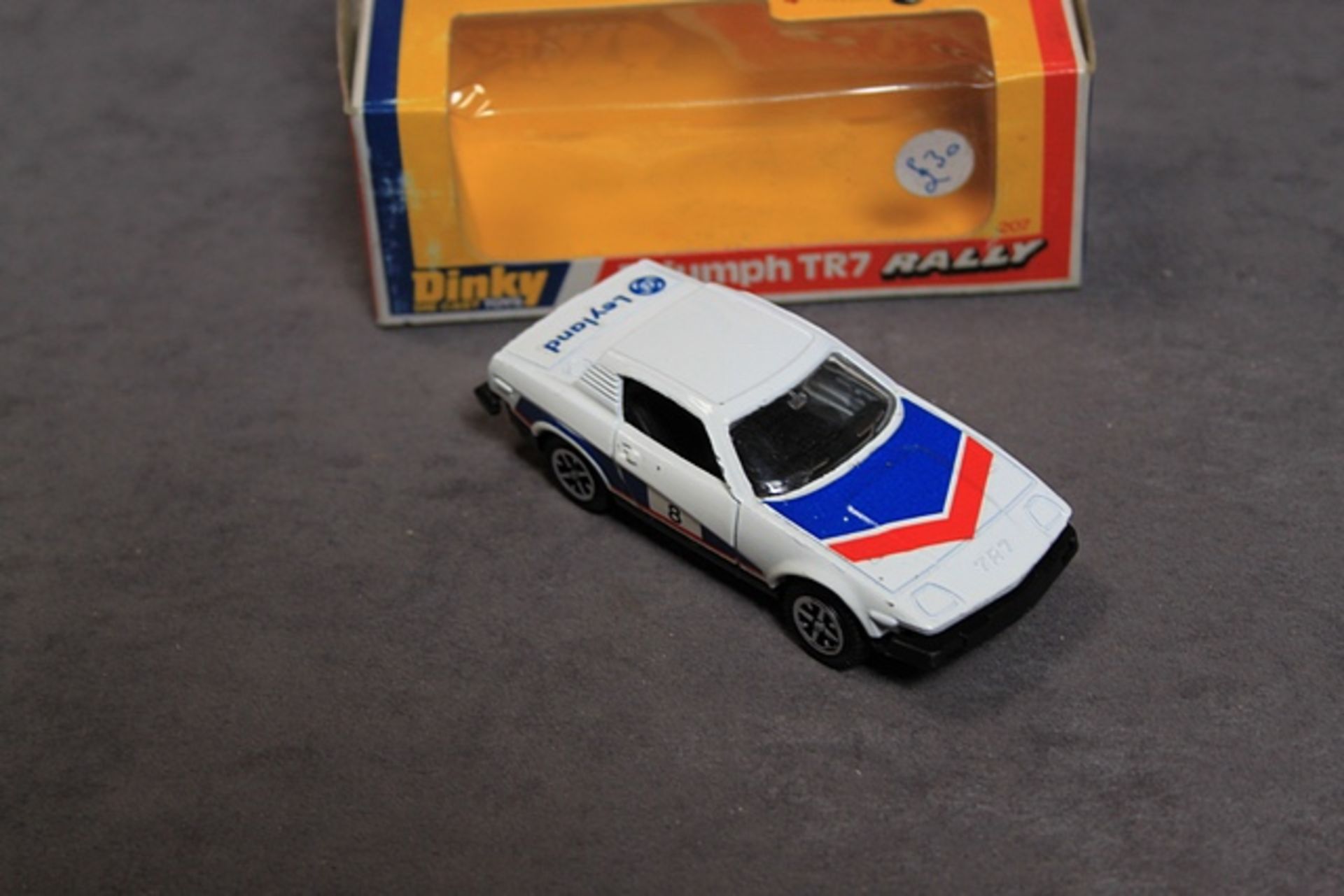 Mint Dinky Diecast #207 Triumph TR Rally White/Blue/Red Racing Number #8, Leyland Logo in Near mint