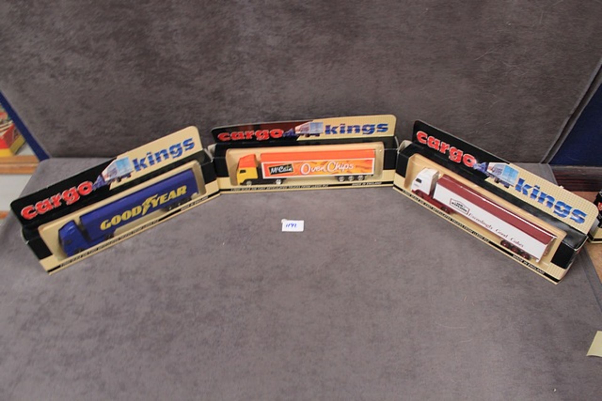 3x Lledo Cargo Kings Lorries - all Boxed, comprising of; Good Year, McCain Oven Chips, Mr Kipling