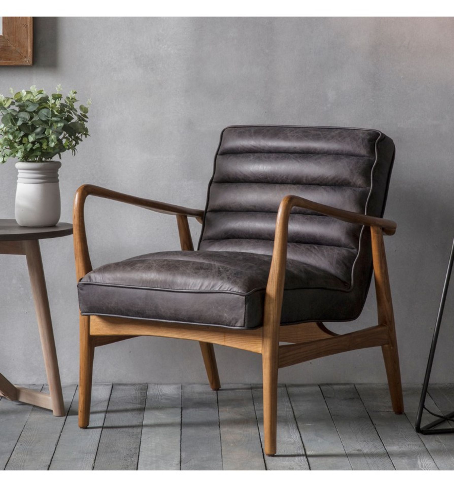 Datsun Armchair Antique Ebony Leather Stylish mid-century design in top grain leather in an
