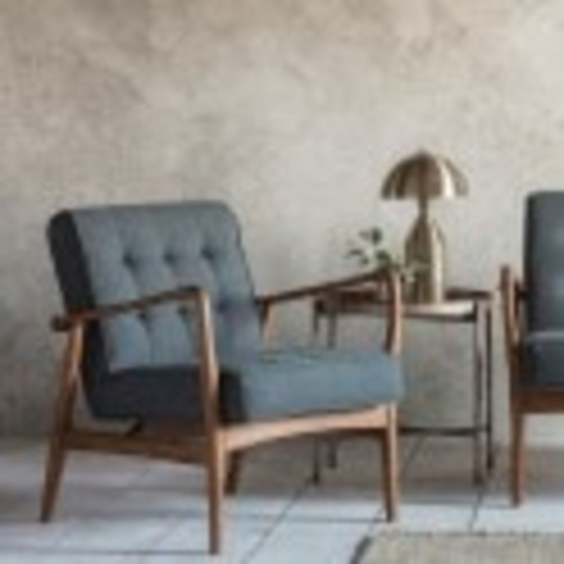 Humber Armchair Dark Grey Linen This distinctive Mid-Century style arm chair has a solid Ash frame